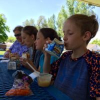Pocatello Students gather at Alameda Park for free summer lunches