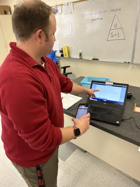 Science teacher Cameron Knigge shows off some of the gadgets the state purchased to help Gooding Middle School overcome dismal test scores four years ago.