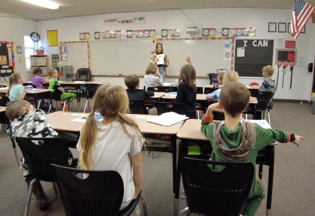 Apprentice Avery Horsley guides Thirkill Elementary School students in Soda Springs.